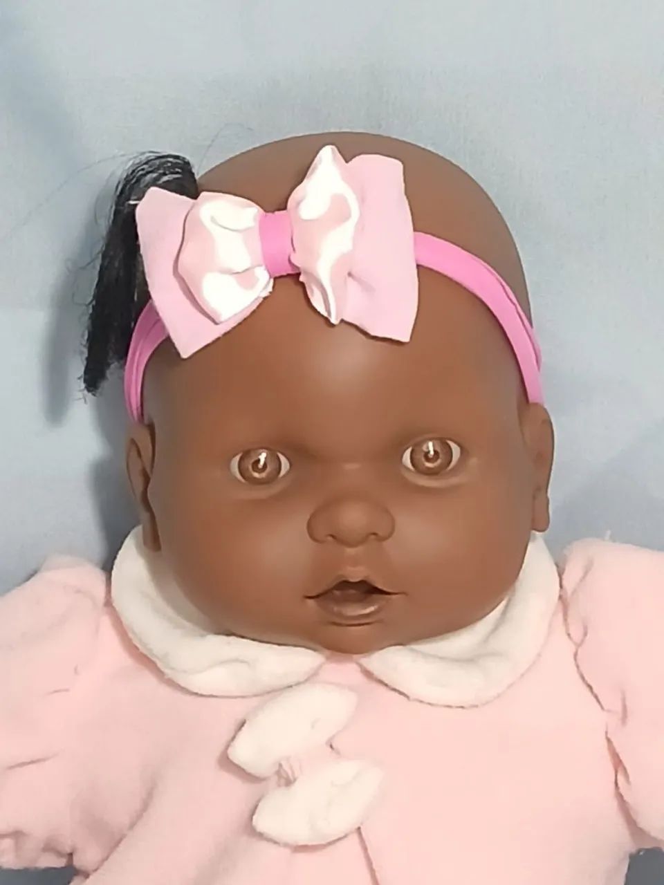 7 - BONECA BEBE CORPO DE PANO 