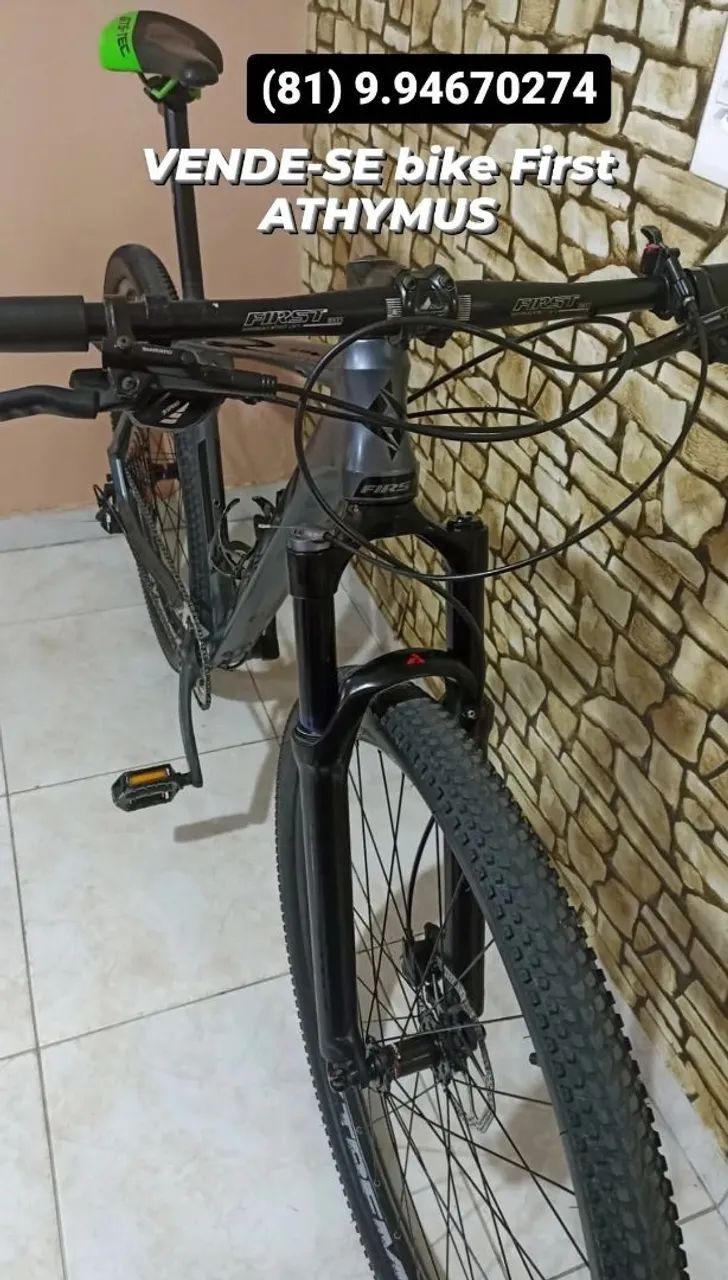 First athymus com suspensão a ar e freios Shimano.  - Foto 3
