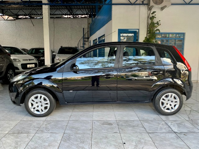 Ford Fiesta 1.0 8v 2014 único dono com ABS + Air bag duplo - Foto 4
