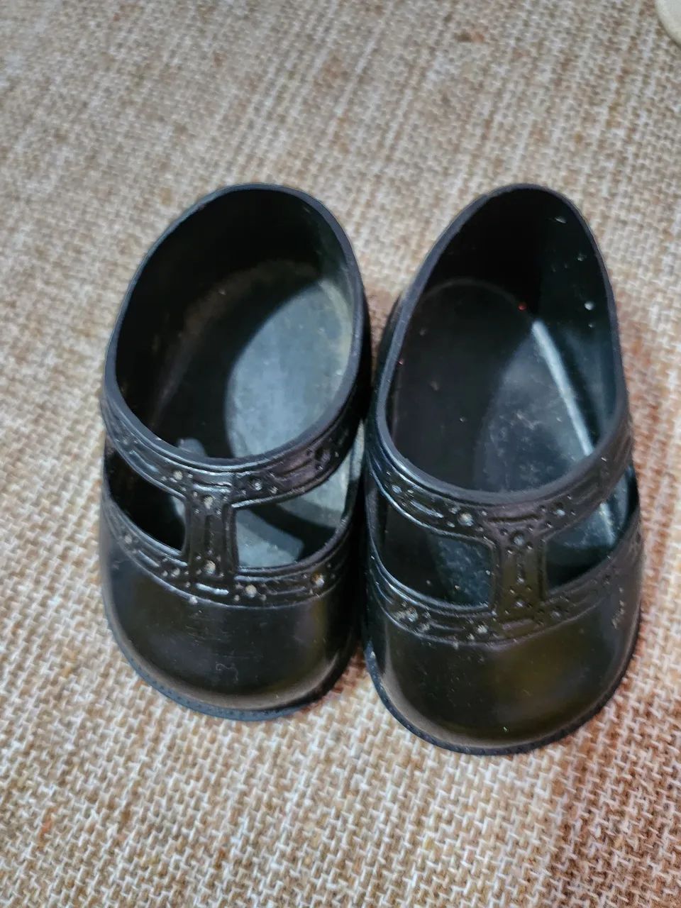 Sapatos de boneca antiga