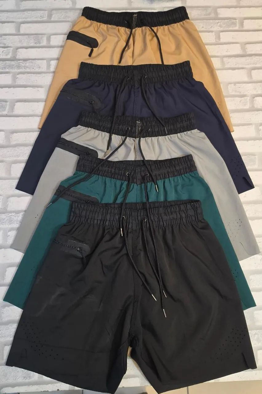 short elastano com zipper no bolso liso 