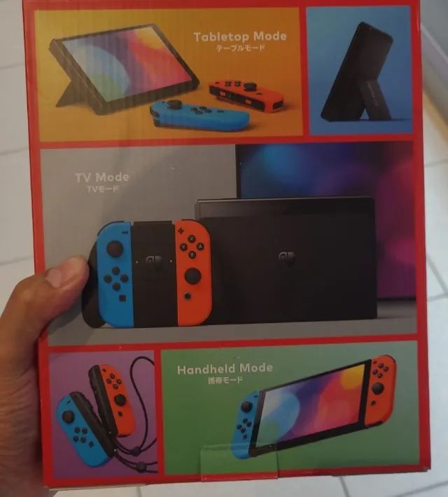 Nintendo Switch Oled 64gb Azul, Preto E Vermelho. - Foto 2