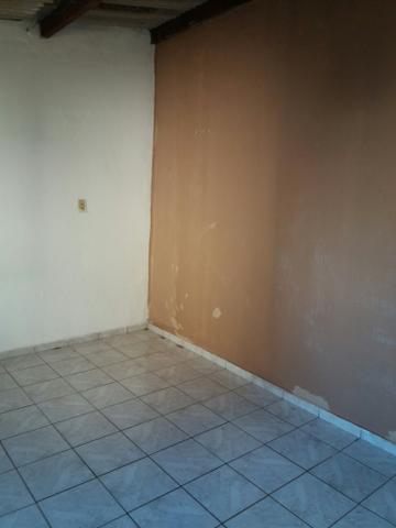 Alugo casa fundo qnj 5
