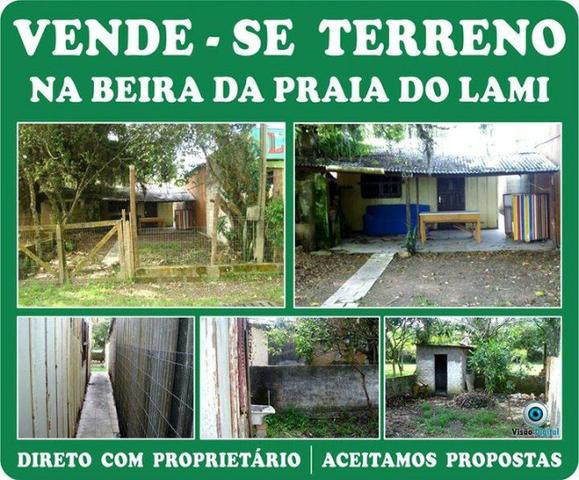 Vende - se terreno na beira da praia do Lami