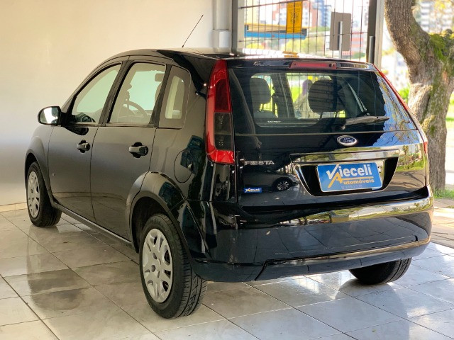 Ford Fiesta 1.0 8v 2014 único dono com ABS + Air bag duplo - Foto 7