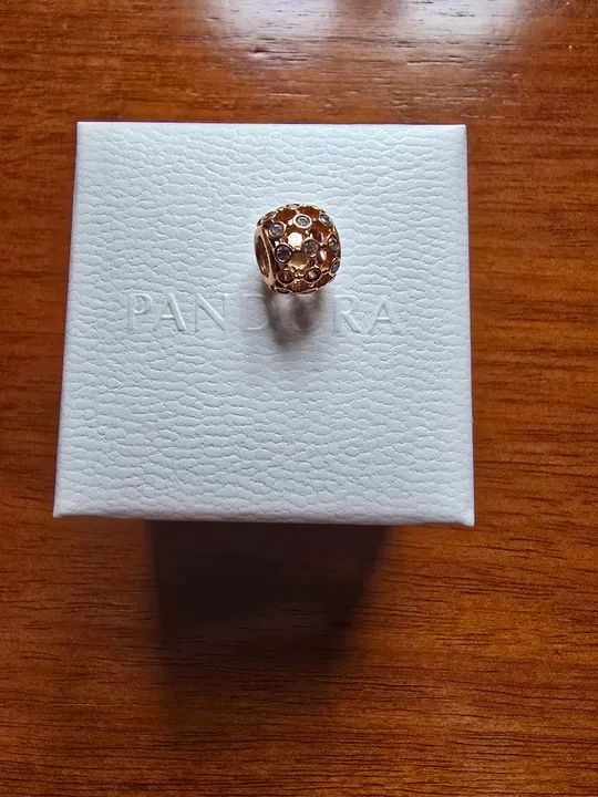 Berloque Pandora Círculo de Luz Ouro Rose