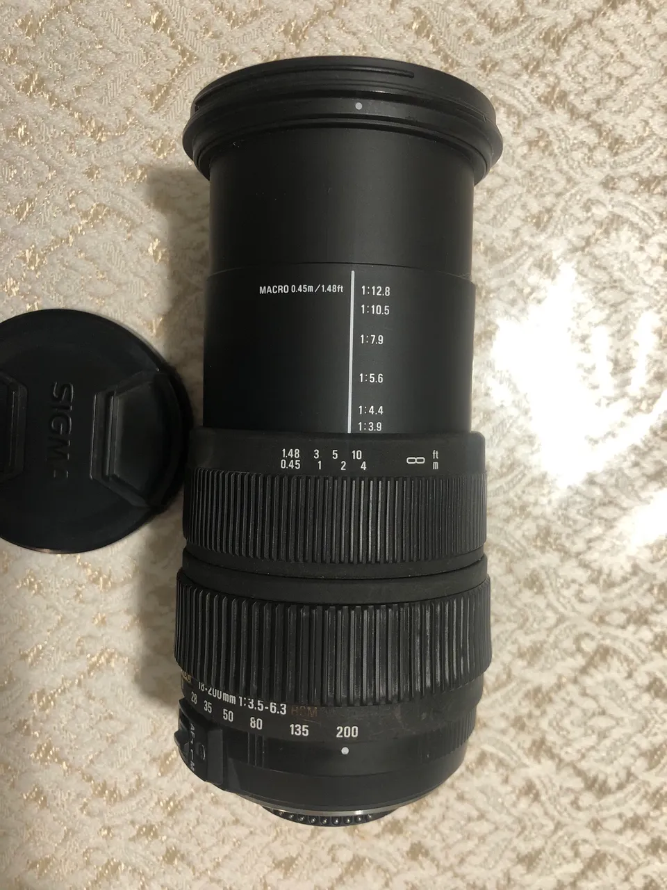 lente sigma 18 200