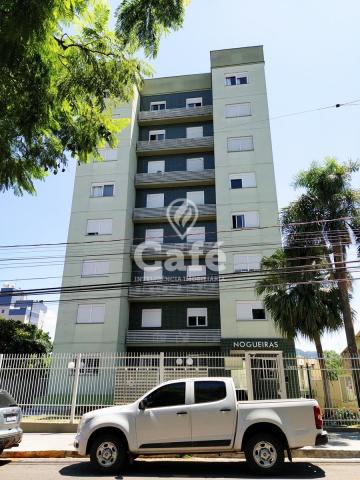 Apartamento de 2 dormitórios, sala, cozinha e área de serviço.