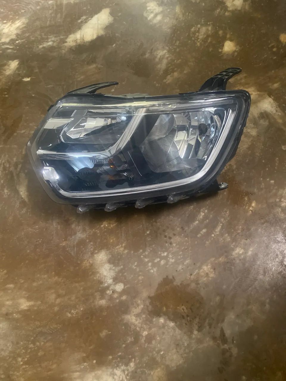 Farol da duster lado esquerdo de led 