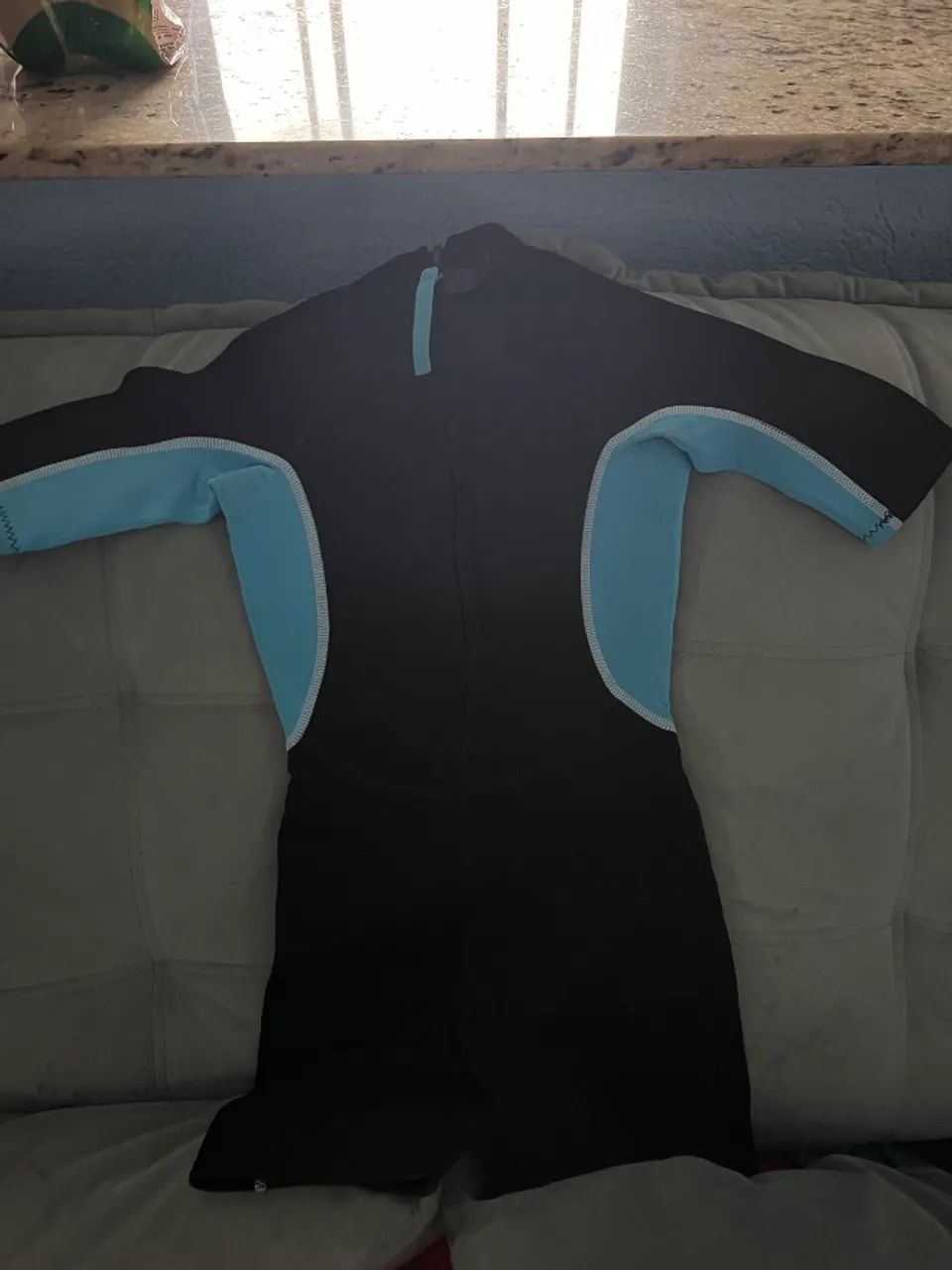 Roupa infantil de surf