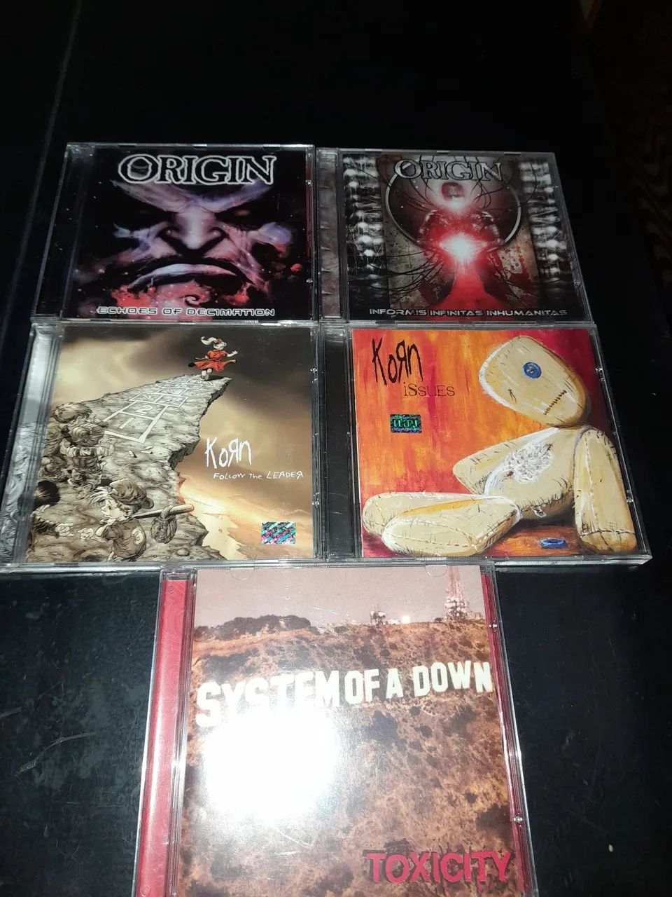 Cds Origin (2); Korn (2) e System of a down. 