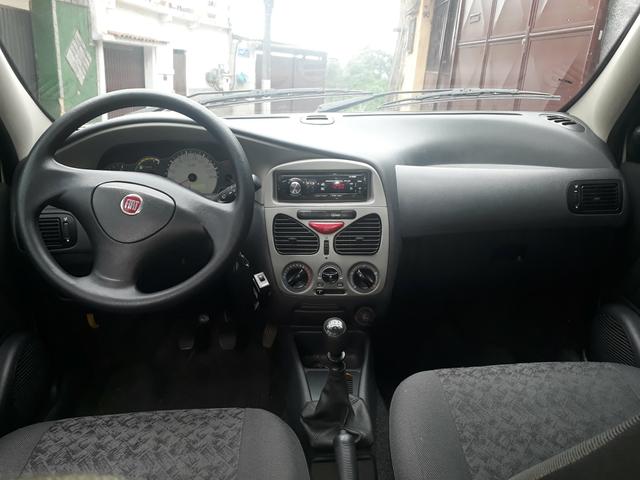 Vendo ou troco Palio economy 1.0 8 valvulas 2010 completa com gnv doc ok muito conservada - Foto 10