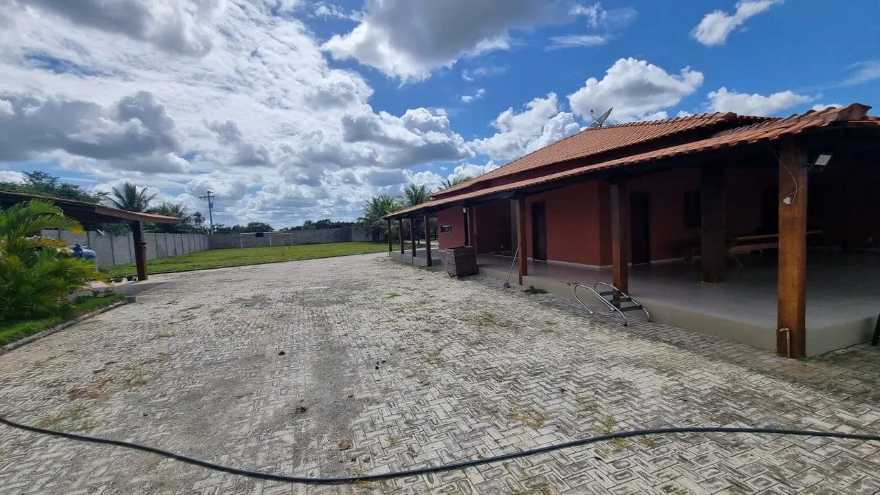 Vendo uma excelente chácara 4/4 sendo três suítes com piscina - Foto 2