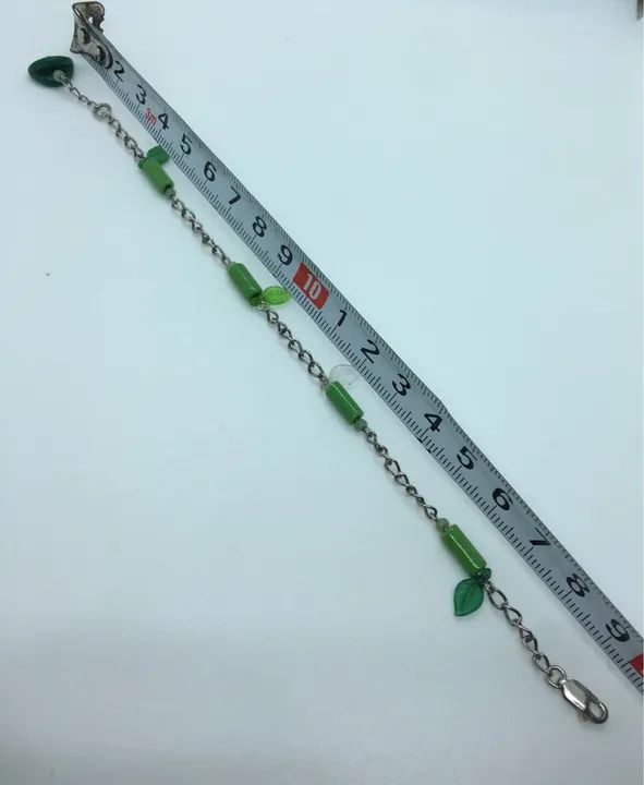 Pulseira de prata 925 com detalhes em folhas verdes - Foto 4
