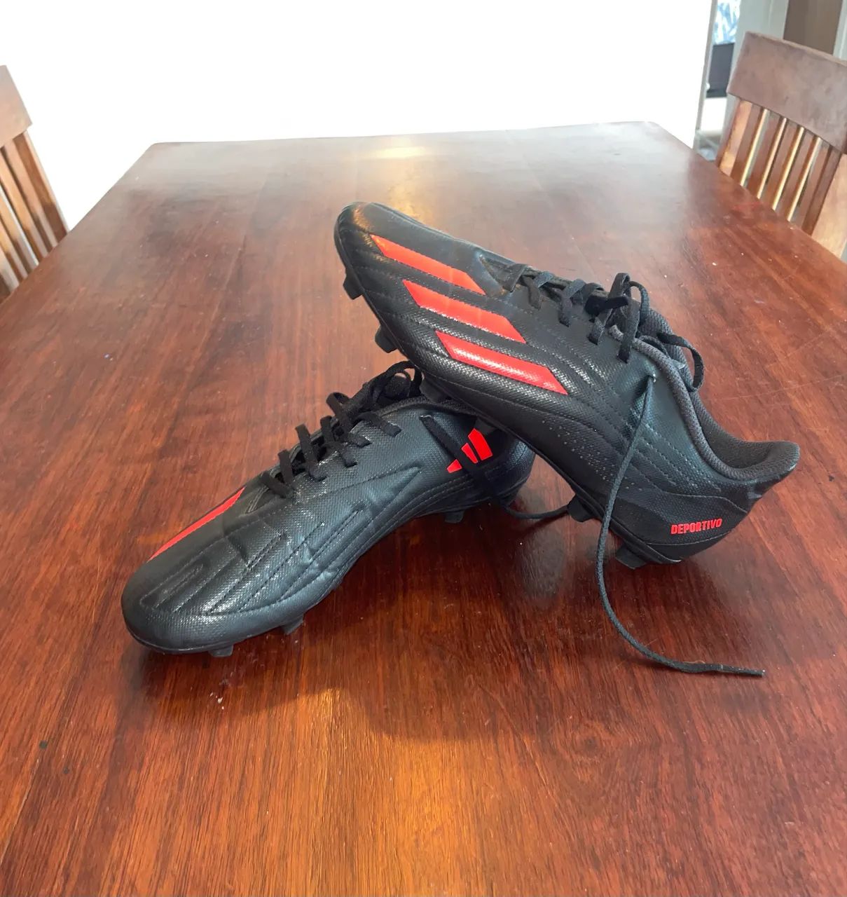 Chuteira adidas campo/cravo nunca usada 