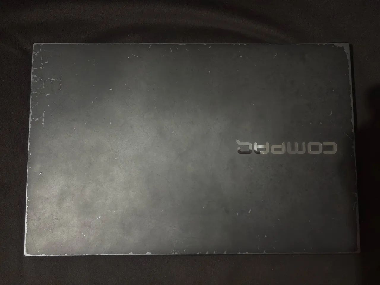 Notebook compaq i15 ssd 222g com mal contato no teclado 