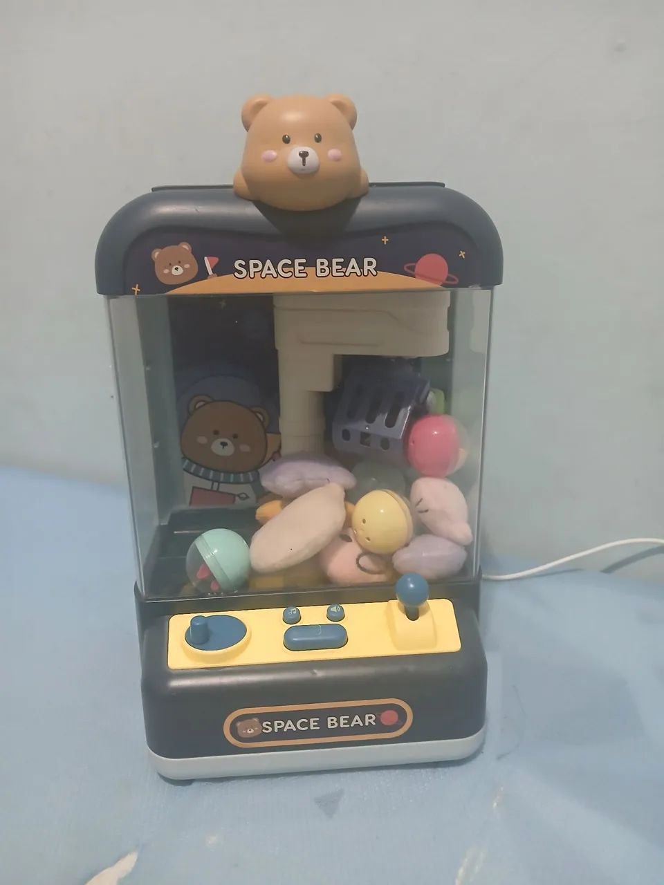 Vendo mini máquina de pegar ursinho