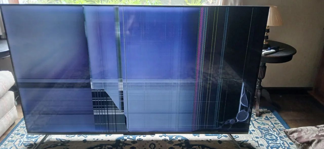 TB TCL 65 com defeito