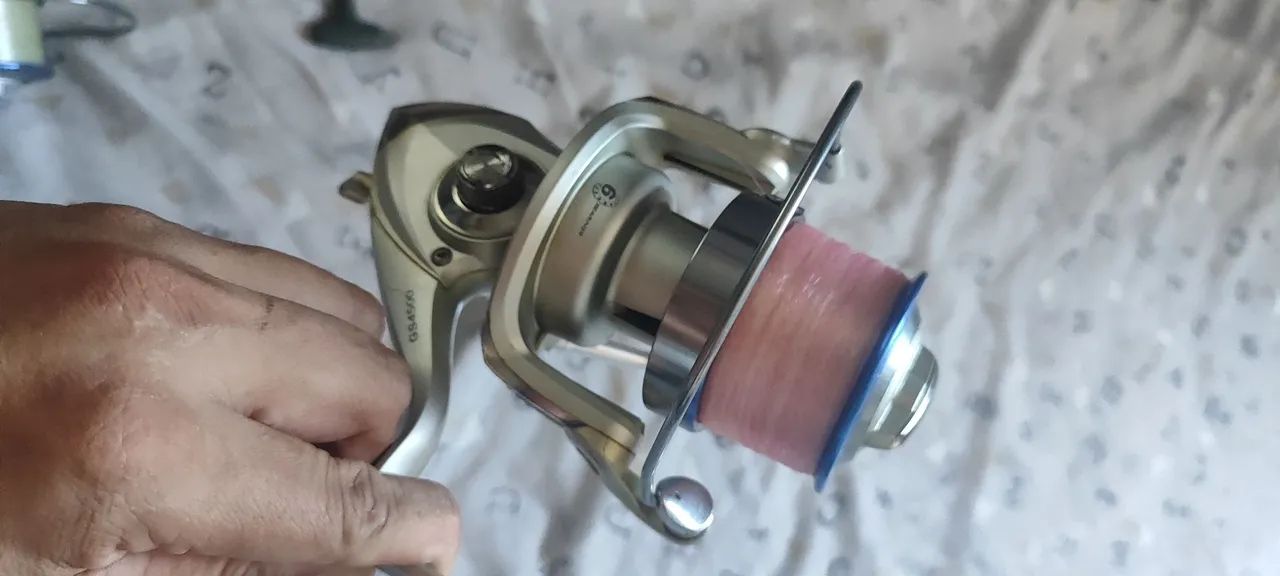 Molinetes e vara de pesca - Foto 6