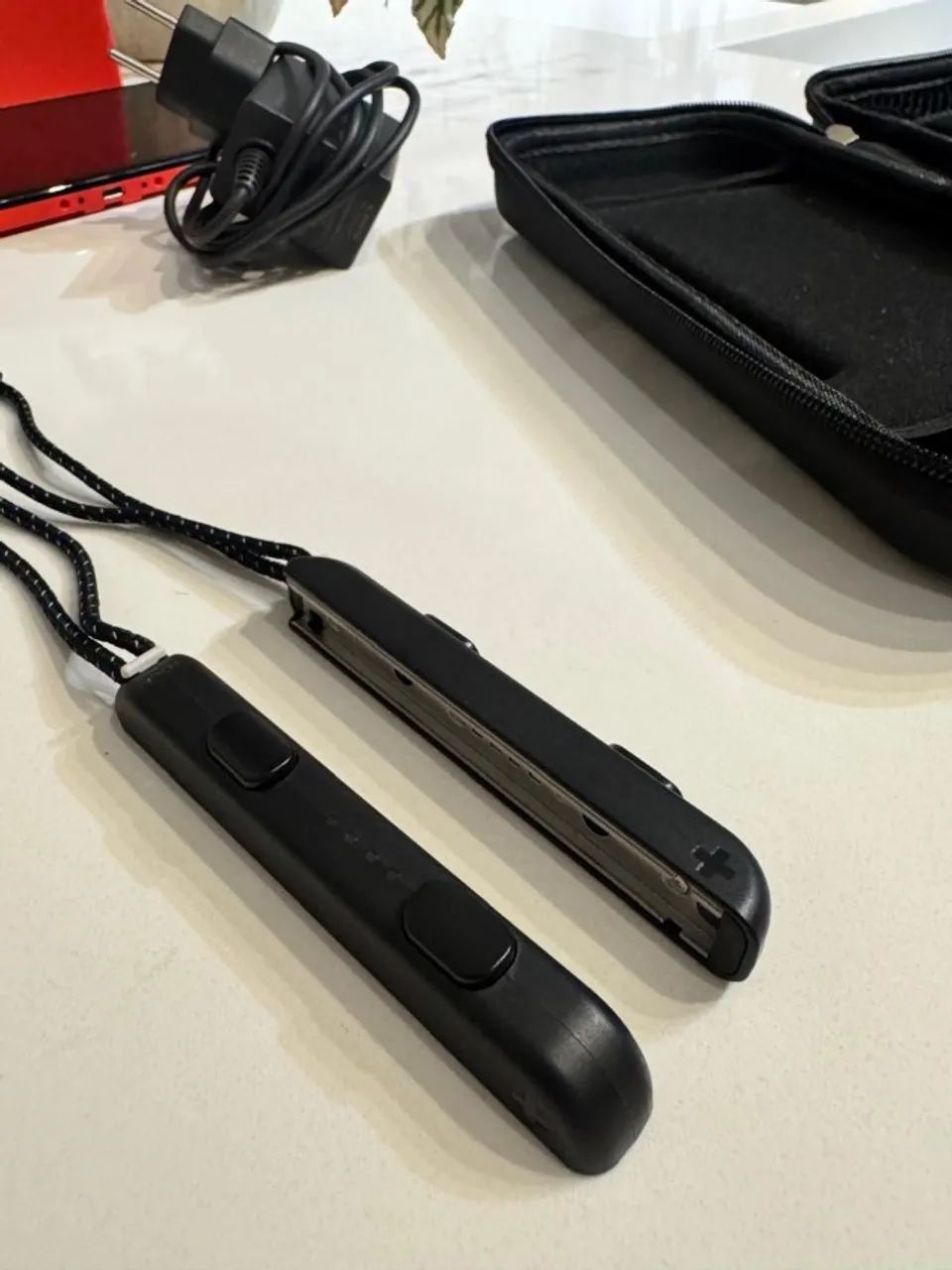 Nintendo Switch OLED  DESBLOQUEADO Vermelho/Azul + Estojo + Suporte + Carregador + Grips  - Foto 5