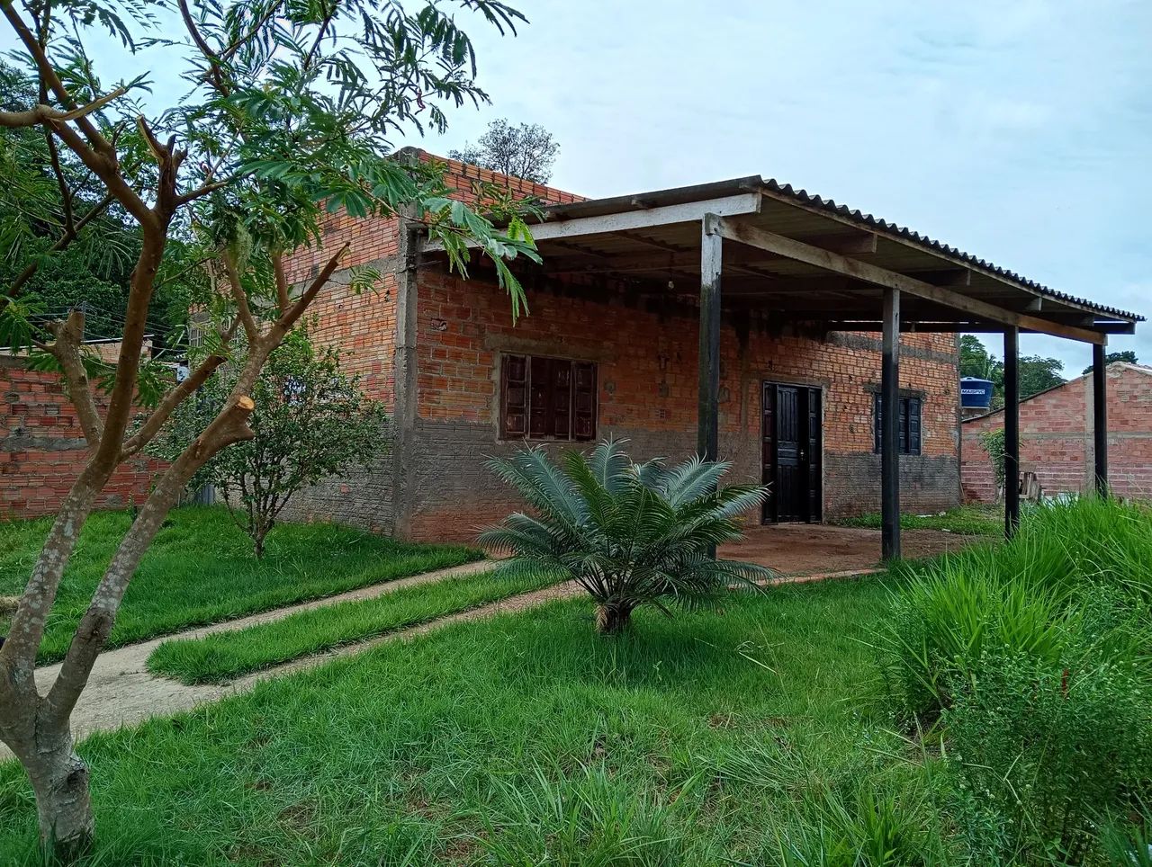 Casa e terreno 