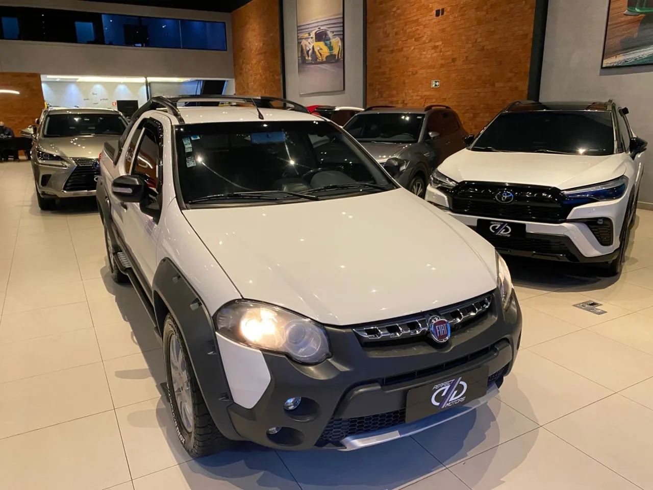 Fiat Strada Adv. Ext./ Ext.1.8 Locker Flex CE 2015