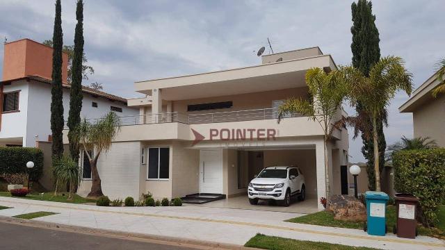Sobrado à venda, 490 m² por R$ 2.400.000,00 - Alphaville Flamboyant Residencial Araguaia -