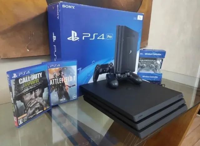 Vendo PS4 PRO 1 Tera com caixa original + 4 jogos - Videogames