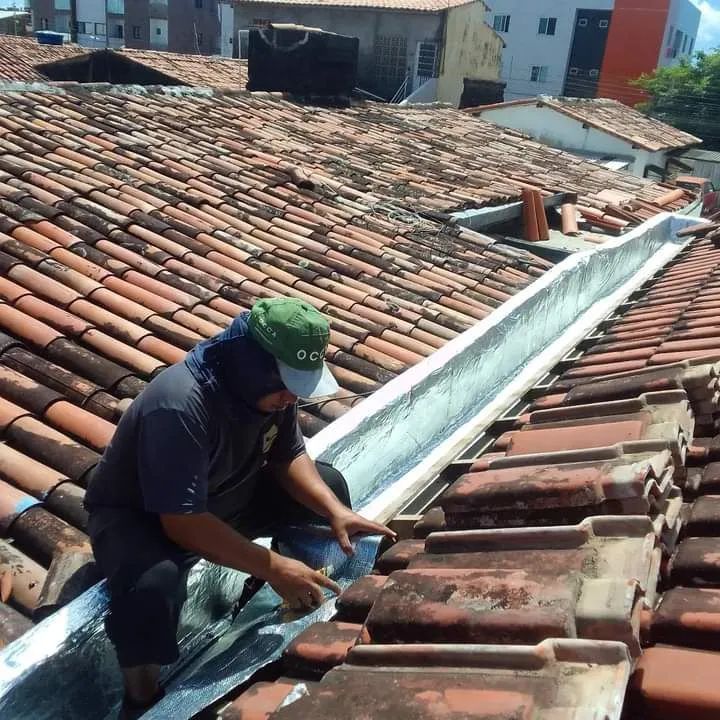 Eric Telhados colocação de manta fria  aplicação de tercly D3 manta líquida 