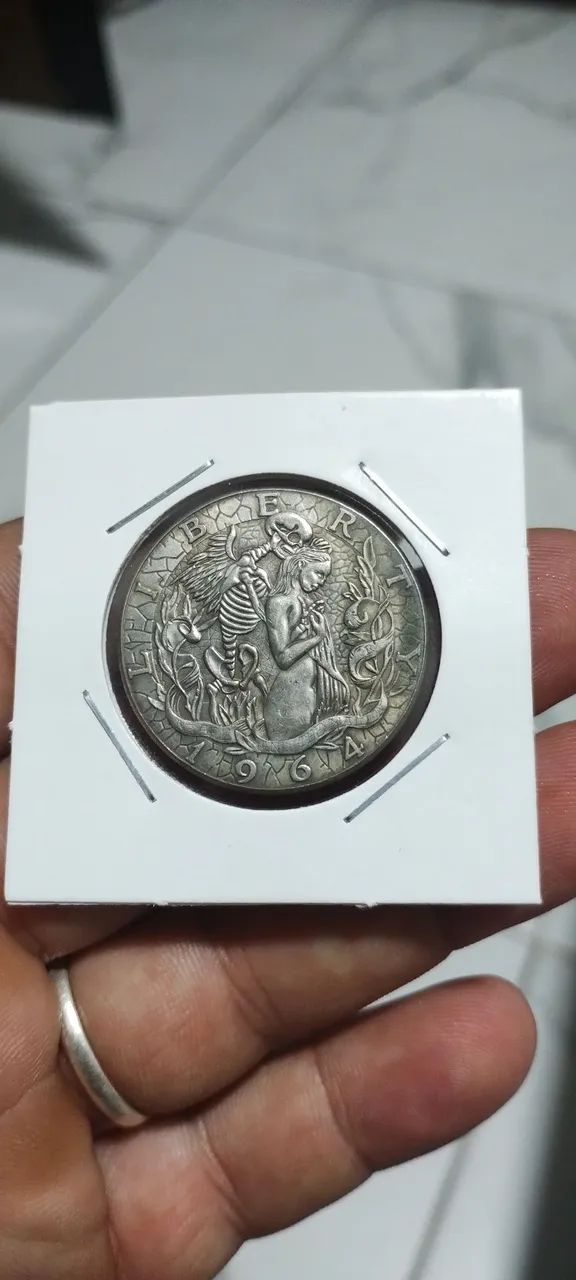 Moeda americana 1964 com caveiras  - Foto 4