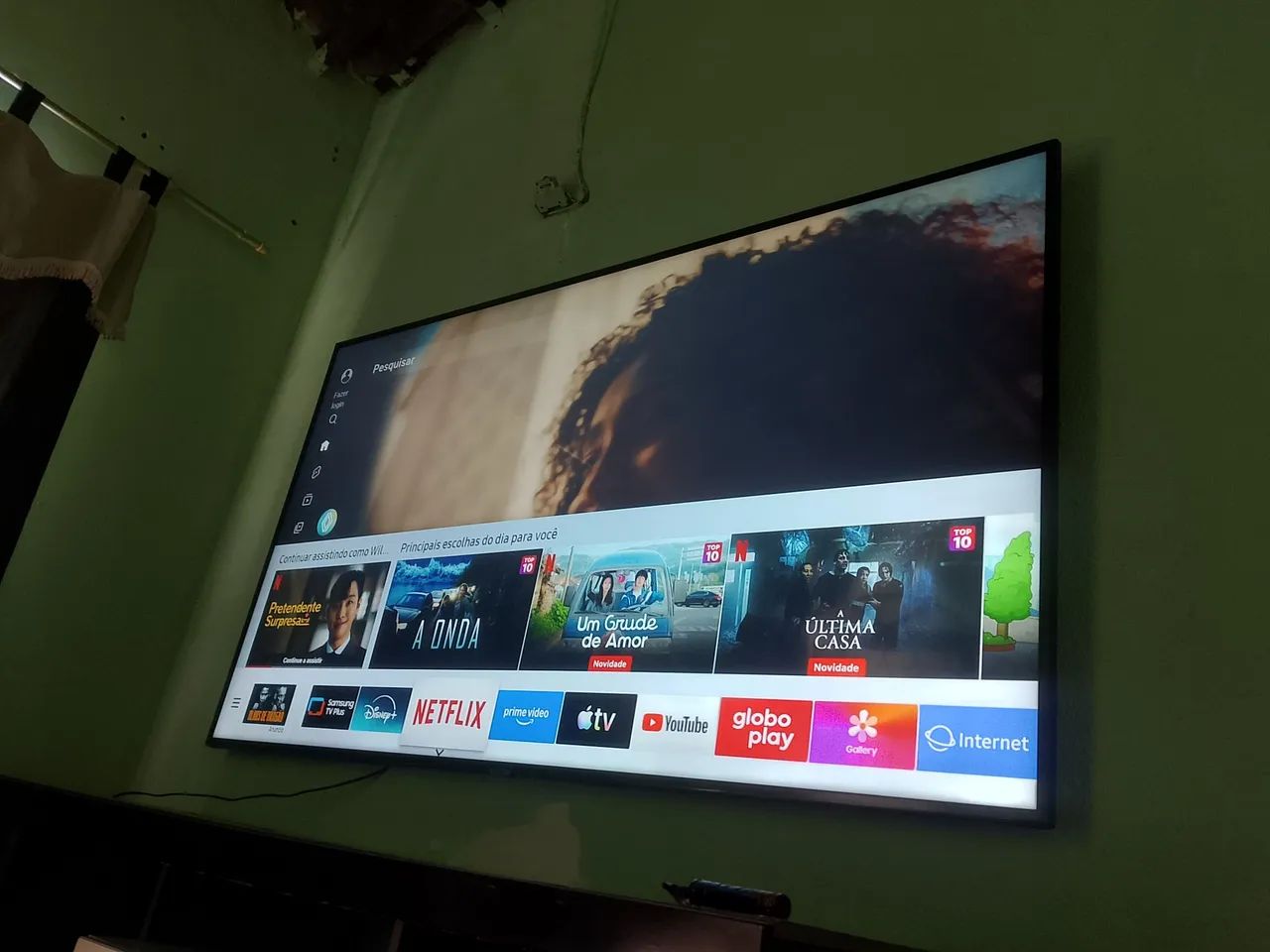 Televisão de 75 polegadas nova troco em moto 125 150 e 160
