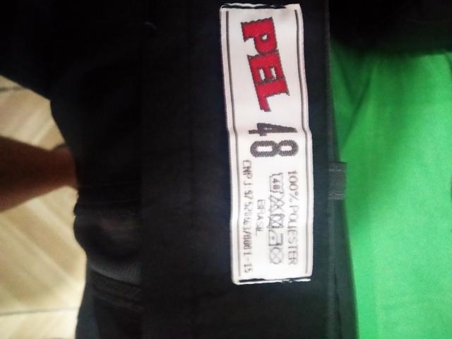 Calça risco de giz cinza n48 100% poliéster nunca usada