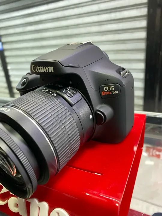 Canon t100 + brindes 1 ano de garantia