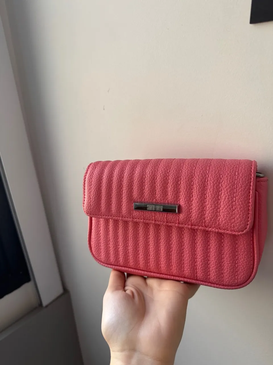 Bolsa rosa da santa lolla