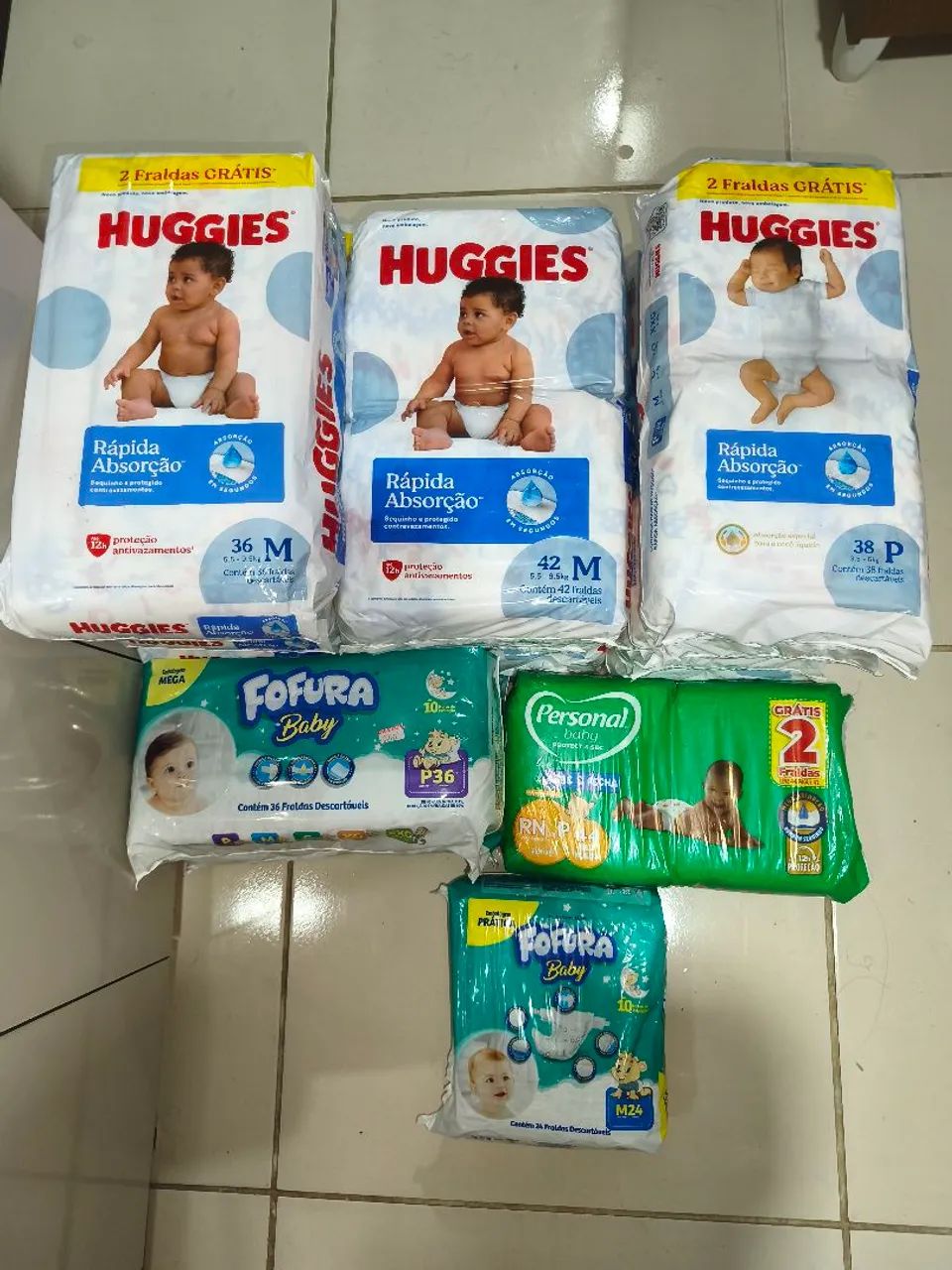 15 pacotes de fraldas