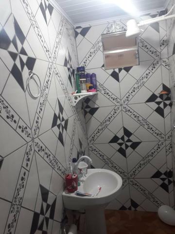 Vende-se ou troca casa150.000 com dois apartamento - Foto 2