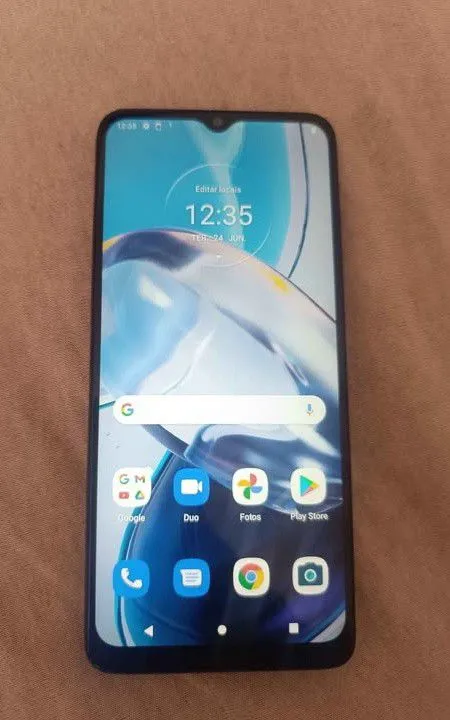 Vendo moto e22 perfeito estado com película capinha 