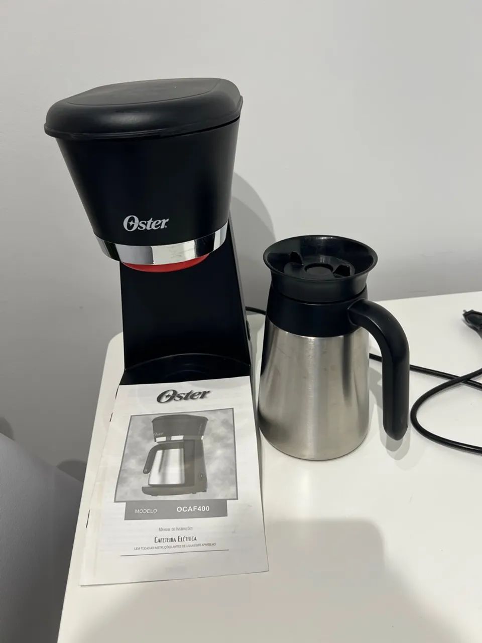 Cafeteira Elétrica Oster com garrafa térmica em inox 110v