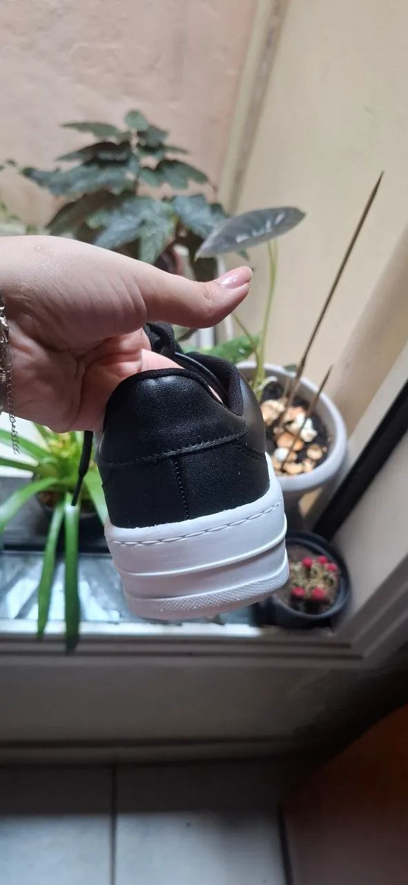 Tênis preto e branco  - Foto 4