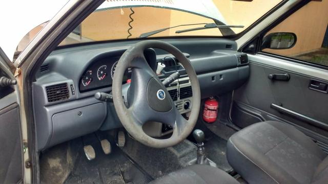 Troco em um carro 4 porta e volto 1.000 $ - Foto 2