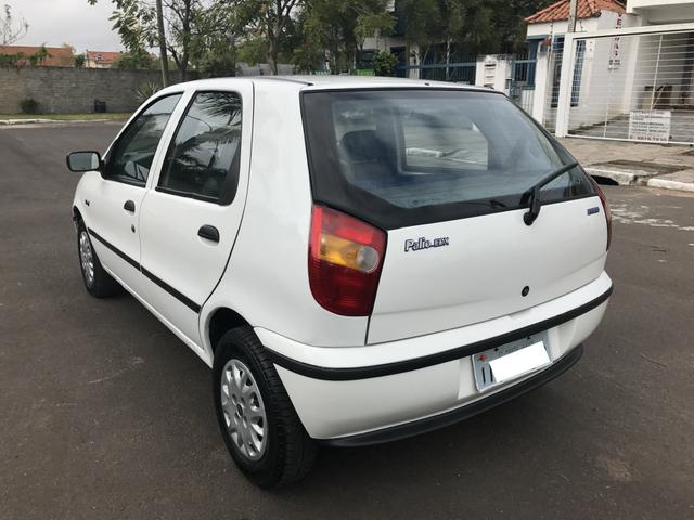 Vendo Palio toda em dia kit gás 2020 em mãos - Foto 2