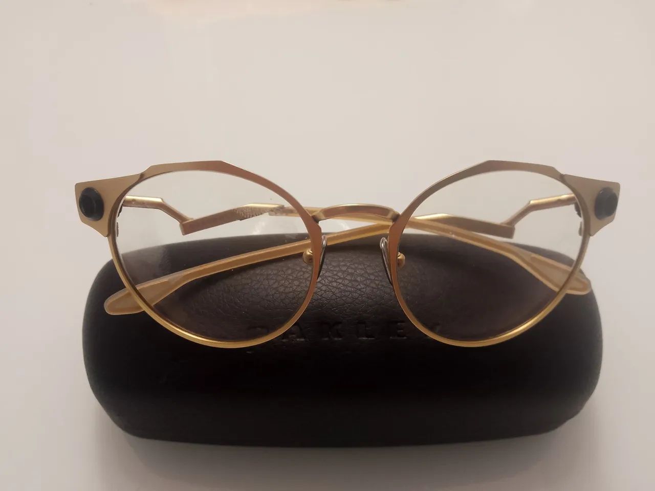 Óculos Oakley Deadbolt com lentes Transitions