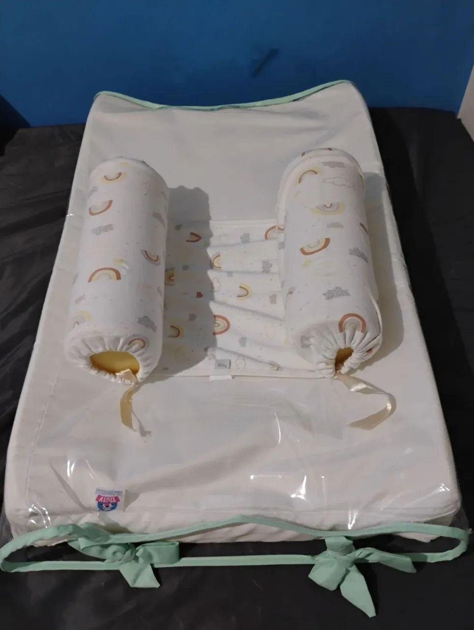 Trocador com rolinhos para bebê