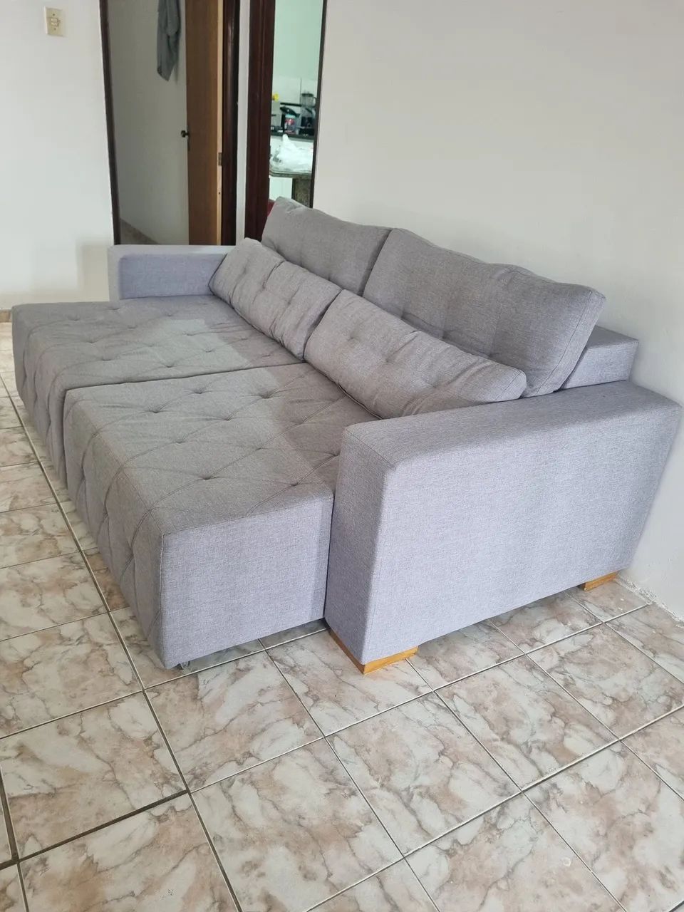 Sofá retrátil em linho