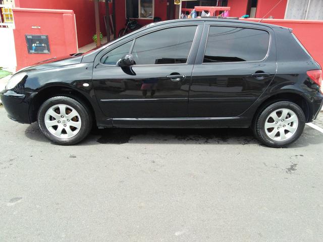 Vendo Peugeot 307 Presenc ano 2006 com ar direção airbags interior em couro valor 18000 - Foto 9