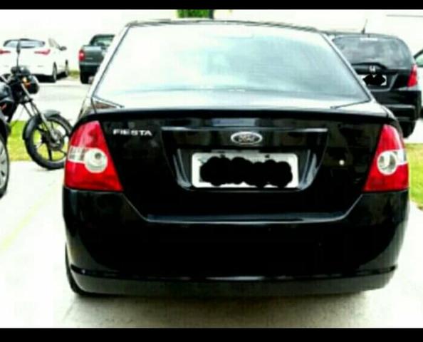 Ford fiesta 1.0 sedan 2009