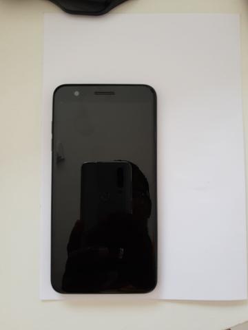 Celular semi-novo