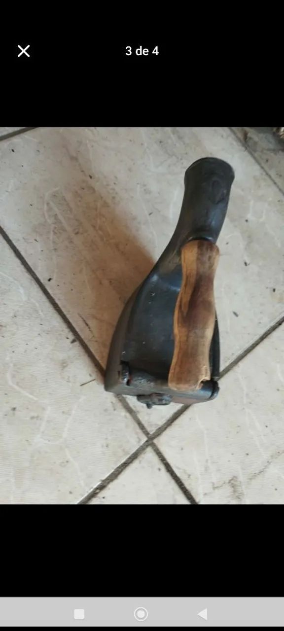 Ferro antigo a brasa tromba de elefante.