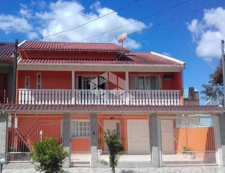 Ótimo sobrado a venda em Canoas/RS no bairro Harmonia 3dorm, 1suíte c/ piscina.
