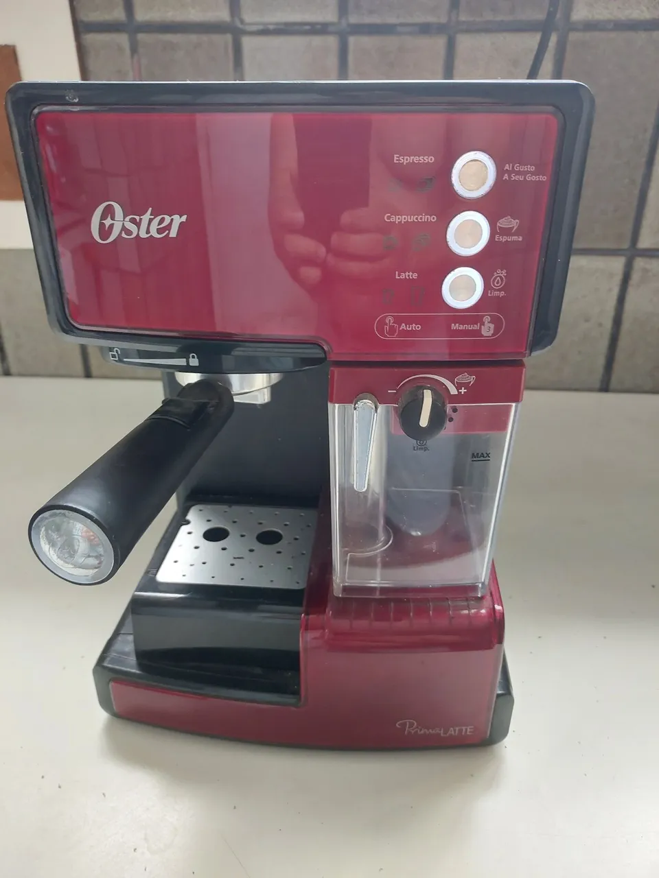 Cafeteira Expresso Oster PrimaLatte R$ 670,00: 4 x SEM JUROS. Precisa limpeza